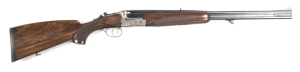 MERKEL MOD.2000E U/O DBL RIFLE: 9.3x74R; 23½” barrels; exc bores; std sights with half length rib to barrels; single select trigger with manual safety; beautiful engraved scalloped action with buck & doe & foliage to lhs of action; wild boars & foliage to