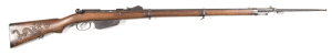 CHINESE BOXER REBELLION MANNLICHER M.88/90 B/A RIFLE: 8x50R; 5 shot mag; 30.1" barrel; g. bore; std sights & fittings; vg profiles & clear markings; thinning blue finish to barrel, receiver & t/guard; g. original stock with the Chinese Boxer dragon carved