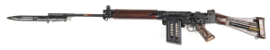 AUSTRALIAN LITHGOW SECTIONIZED L1.A1 SEMI-AUTO SERVICE RIFLE: 7.62 Cal; 20 round mag with a full clip of dummy rounds; 21" barrel; std sights & fittings; sections of the lhs of the action are cut-away to reveal internal parts for instructional purposes; b