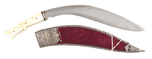 QUALITY GHURKA IVORY HANDLED KUKRI KNIFE: g.13” blade of traditional form with areas of v. light staining; aged ivory handle with raised centre section & having a cream colour with fine aged features; complete with burgundy coloured velvet scabbard with o