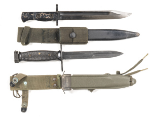 LOT X 2 KNIFE BAYONETS: Australian S.L.R.; g. 8" Bowie shaped blade; g. grips & hilt with 70% black paint finish remaining; vg scabbard & webb frog. U.S. M 8A1: g. 6 5/8" blade; vg hilt & grips; g. correct scabbard. N/L