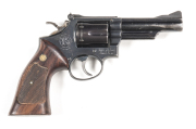 SMITH & WESSON MOD 19 COMBAT MAGNUM REVOLVER: 357 Rem Magnum; 6 shot fluted cylinder; 102mm (4") barrel; vg bore; std sights, barrel markings, address & trade mark to rhs of frame; vg profiles & clear markings; retaining 90% original black finish with mos