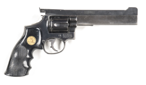 SMITH & WESSON MOD 15 COMBAT MASTERPIECE BY MUSCRAT CUSTOM REVOLVER: 38 S&W Special; 6 shot fluted cylinder; 153mm (6") barrel; vg bore with Aristocrat sights; MUSCRAT CUSTOM to lhs of barrel; S&W address to rhs of frame; S&W trade mark to lhs; g. profile