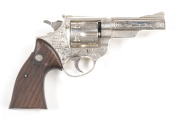 ASTRA ENGRAVED 357 D/ACTION REVOLVER: 357 Cal; 6 shot fluted cylinder; 102mm ( 4") barrel; g. bore; std sights; foliate engraved frame & areas of the barrel & cylinder; ASTRA trade mark to rhs of frame; retaining 80% original nickel finish; vg Astra woode