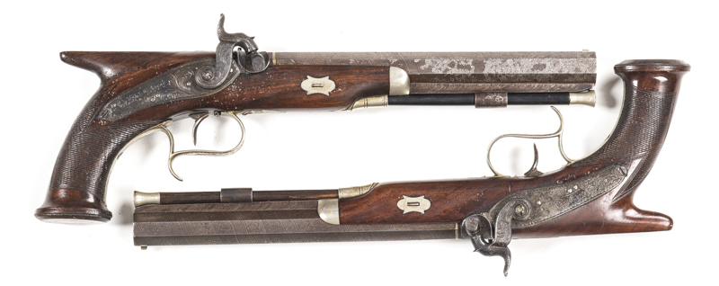 PR OF ENGLISH S/B PERC SAW HANDLE ½ STOCKED COACH PISTOLS: 28 bore; 8½" oct barrels with platinum dovetail front sights & single platinum band to the breeches; top barrel flats inscribed LONDON, FINE WIRE & DAMASCUS TWISTED; foliate engraved hammers & bac