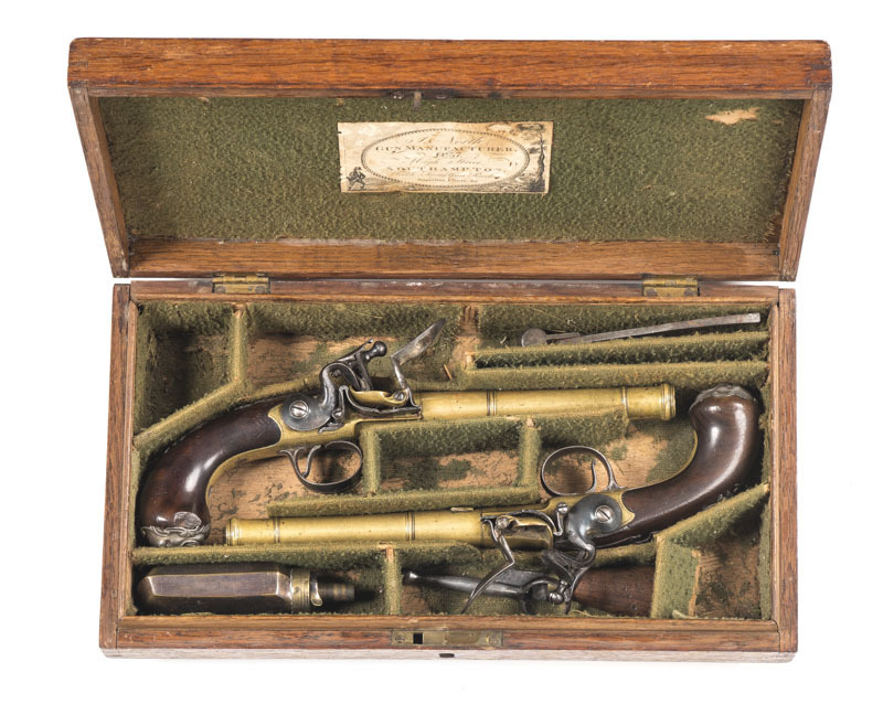 CSD PAIR OF SILVER MOUNTED QUEEN ANNE FLINTLOCK PISTOLS by WILSON: 18 bore; 7" brass cannon barrels with LONDON & trophies & flags to breech; borderline engraved frame marked WILSON & struck with London proofs & RW; fitted with swan necked cocks & integra