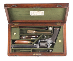 SCARCE CASED 1851 ROBT ADAMS DRAGOON PERCUSSION REVOLVER: 38 bore; 5 shot cylinder; 195mm (7½") oct barrel; g bore; std sights; REILLY 302 NEW OXFORD ST LONDON to top strap; borderline & foliate engraved frame; sharp profiles, clear address; 80% of orig b