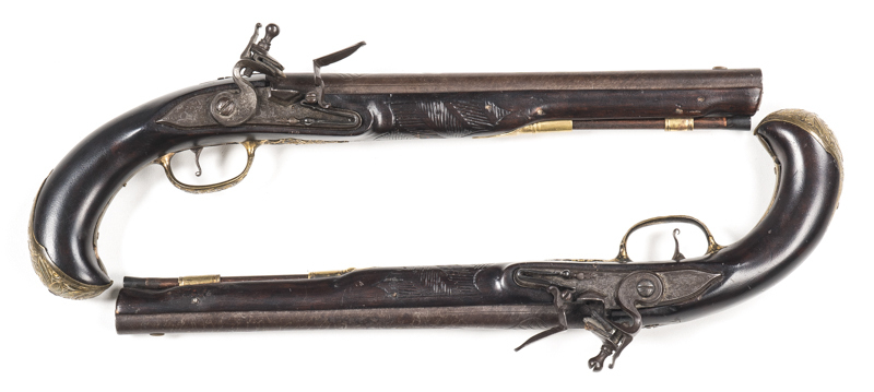 PR OF FULL STOCKED CONTINENTAL F’LOCK HOLSTER PISTOLS: 600 Cal; 11¼" rnd barrels with sml brass blade front sights; g. bores; locks engraved with mounted Troopers; fitted with swan necked cocks & detached pans; ornate gilt brass t/guards; side plates with