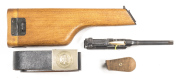 C96 PARTS & ACCESSORIES: vg modern Mauser stock, “as new”; original wooden grips, used; barrelled action with sights, s/n 846344; leather military army belt; all good cond.