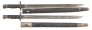 LOT X 2 BRITISH 1907 PATT BAYONETS: g. blade by Sanderson & dated 1918; 3 DáD to cross guard; f to g grips; with correct scabbard. G. blade by Wilkinson & dated 1916; g. grips; with correct scabbard; both g. cond.