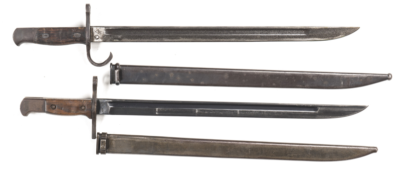 LOT 2 JAPANESE TYPE 30 BAYONETS: with straight quillions; vg+ 15 5/8" blade; MATSUSHITA NATIONAL mark to ricasso; retaining 90% original factory finish; vg hilt & grips; complete with steel scabbard. G. 15½" blade with staining; Nagoya & triangle mark to