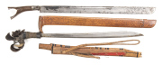 LOT X 2: BORNEO HEAD HUNTER'S SWORD: vg 20½" blade with groove to back edge on rhs; ebony grip bound with intricate woven brass wire; dragon's head pommel with hair decoration; complete with vg curved wooden scabbard. KLEWANG KNIFE SWORD: broad 23" blade