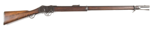 VICTORIAN COLONIAL ISSUE MARTINI HENRY MKII-1 RIFLE: 450-577 Cal; 33.2" barrel; g. bore; std sights & fittings; rhs of action marked ROYAL CYPHER V.R. ENFIELD & dated 1884 III-I; slight wear to profiles & action markings; blue/plum finish to barrel, actio