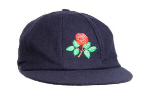 MICHAEL ATHERTON'S LANCASHIRE CRICKET CAP, blue with attractive embroidered Rose on front, signed inside by Mike Atherton. G/VG condition. [Mike Atherton played 115 Tests & 54ODIs for England 1989-2001, including a record 54 Tests as captain; also for Lan