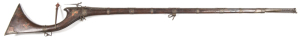 SINDI MATCHLOCK FULL STOCK GUN: .52" Cal; 47" round twist barrel with flared muzzle, raised barrel swirl twist design & decorative carvings to breech; conventional lock design; typical Afghan stock with 9 brass barrel bands & brass caps, plates, inserts &