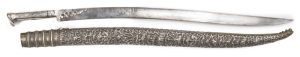 C.1700 IMPRESSIVE OTTOMAN SILVER MOUNTED YATAGHAN SHAPED SWORD: g. 26" blade with decorative chiselled silver mounts applied to the forte, Maker's mark, Islamic script to the back edge, obverse side has quotes from the Koran; silver Niello hilt of traditi