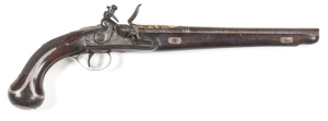 TURKISH MADE, IN THE FRENCH STYLE, SILVER MOUNTED FULL STOCKED FLINTLOCK HOLSTER PISTOL: 20 bore; 11½" barrel; f. bore; breech chisel engraved with trophies& flags with a gold washed background; stepped lock plate with a bolted safety & decorated with fol