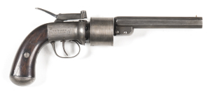 T.K. BAKER SPUR HAMMER PERCUSSION TRANSITION REVOLVER: 44ML; 6 shot non fluted cylinder; 127mm (5") oct barrel; g. bore; std sights; Birmingham proofs to cylinder; partial engraved frame with bolted safety to lhs; centre hammer action marked BAKERS PATENT