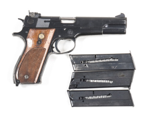 SMITH & WESSON MODEL 52-2 S/A PISTOL: 38 SP; 5 shot mag; 127mm (5") barrel; g. bore; std sights; S&W & address to lhs of slide; S&W Trade mark to rhs of frame; sharp profiles & clear markings; 95% original blue finish remains; g. chequered walnut grips wi