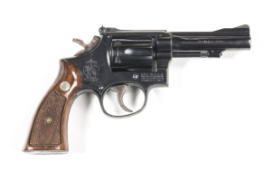 SMITH & WESSON MODEL 48 MASTERPIECE R/F REVOLVER: 22 LR; 6 shot fluted cylinder; 102mm (4") barrel; g. bore; std sights & barrel markings; S&W address & S&W trade mark to rhs of frame; sharp profiles, clear address & markings; 97% original blue remains; v