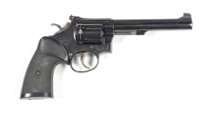 SMITH & WESSON MODEL 67 COMBAT MASTERPIECE C/F REVOLVER: 38 S&W Special; 6 shot cylinder with visible drag mark; 150mm (5 7/8") barrel; g. bore; std sights, S&W address & Trade mark to rhs of frame; vg profiles & clear markings; 97% original blue finish r