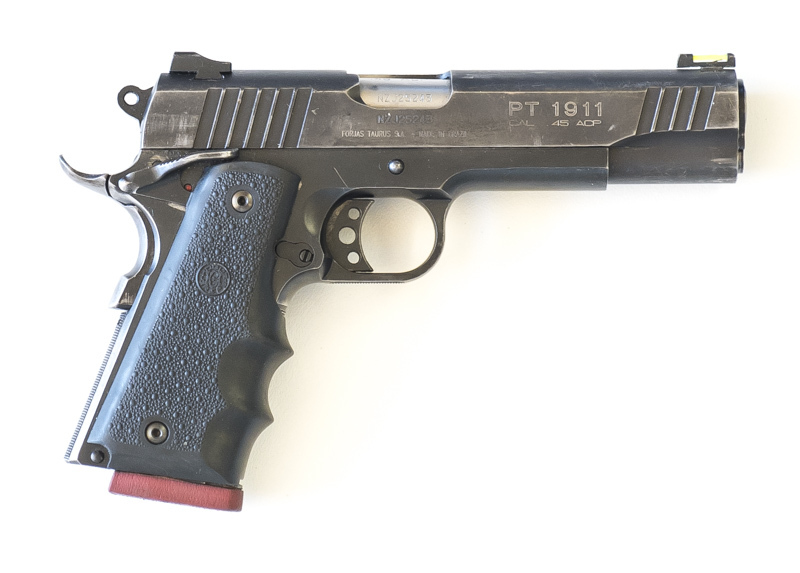 TAURIS MOD. PT 1911 S/A PISTOL: 45 ACP; 8 shot mag; 127mm; (5") barrel; g. bore; std sights, barrel address & fittings; g. profiles & markings; thin blacked finish to slide & grip frame, 80% to frame; vg rubber grips; gwo & cond. #NZJ 26243 Post '47 L/R