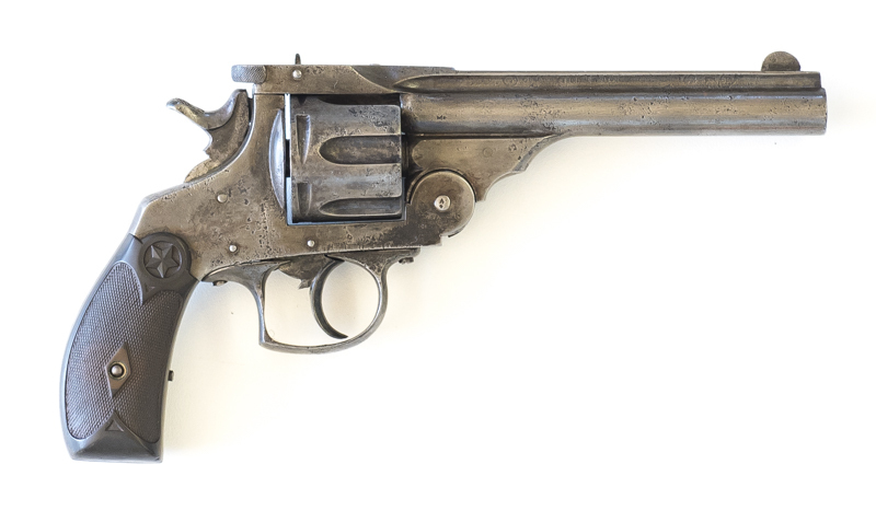 BELGIUM COPY OF A SMITH & WESSON DOUBLE ACTION 1ST MODEL REVOLVER: 450 Cal;6 shot fluted cylinder: 143mm (5 5/8") barrel; p. bore; std S&W type sights; no visible address or markings except Calibre marking to lhs of frame; wear to profiles; fine pitted su