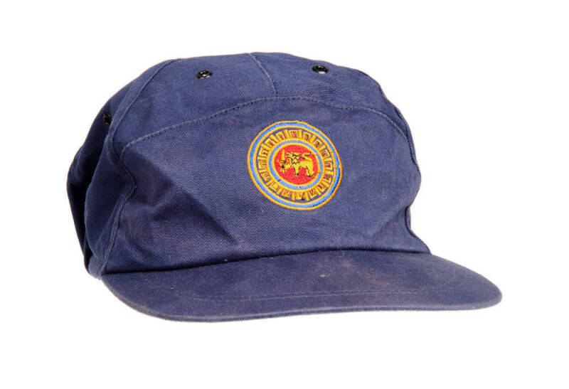 MUTTIAH MURALITHARAN'S SRI LANKA CRICKET CAP, baseball-style, blue with embroidered Sri Lankan Lion logo on front, signed inside by Muttiah Muralitharan. Good match-used condition. [ Muttiah Muralitharan played 133 Tests & 341 ODIs 1992-2011].