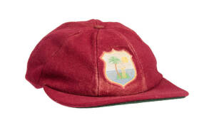 BRIAN LARA'S WEST INDIES TEST CAP, maroon wool, with embroidered West Indies logo on front, signed inside by Brian Lara. Match-used with some wear marks. [Brian Lara played 133 Tests & 299 ODIs 1990-2007, and is widely regarded as one of the finest batsme