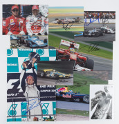 FORMULA 1 RACING DRIVERS: signed photographs or postcards noting Tony Brooks on black & white photograph, Jack Brabham on postcard, Jody Scheckter on postcard, David Coultard signed photo driving for Red Bull (29.5x21cm), Jensen Button signed podium phot