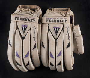 GRAHAM HICK'S batting gloves: a pair of match-used Duncan Fearnley brand gloves, both signed by Hick. Rhodesian born, Hick played for Zimbabwe 1983-86 and for England 1991-2001 appearing in 65 Tests and made more than 41,000 runs in all First Class matches.