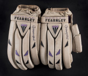 GRAHAM HICK'S batting gloves: a pair of match-used Duncan Fearnley brand gloves, both signed by Hick. Rhodesian born, Hick played for Zimbabwe 1983-86 and for England 1991-2001 appearing in 65 Tests and made more than 41,000 runs in all First Class matche