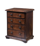 An Australian apprentice chest, stained red pine, circa 1900, top to drawers fitted with compartments, 35.5cm high, 29cm wide, 19cm deep. PROVENANCE: The Rodney Pemberton Collection