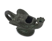 An antique oil lamp, cast bronze in the form of LEDA AND THE SWAN, 18th/19th century, ​15.5cm across - 2