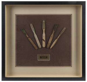 BATHROOMALIA - TOOTHBRUSHES: group of five c.1875 bone toothbrushes (without bristles), one by G.B. Kent & Sons (London), attractively framed & glazed, overall 48x50cm.