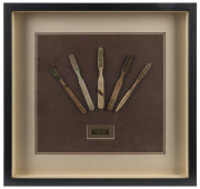 BATHROOMALIA - TOOTHBRUSHES: group of five c.1875 bone toothbrushes (without bristles), one by G.B. Kent & Sons (London), attractively framed & glazed, overall 48x50cm.