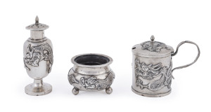 Chinese silver three piece condiment set with dragon decoration by Wang Hing, circa 1900, character mark to base stamped "W.H.90", the tallest 8cm high