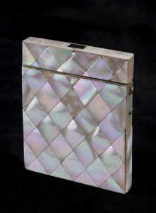 An antique calling card case, mother of pearl with ivory trim and silk lining, 19th century, 10cm high