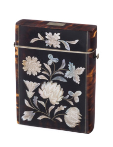 An antique calling card case, tortoiseshell and mother of pearl with ivory trim and silk lining, 19th century, 10cm high