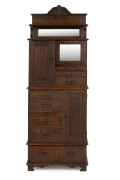 An antique dentist's cabinet, American, solid oak with maple and pine secondary timbers, made by "The American Cabinet Co.", late 19th century, 188cm high, 69cm wide, 38cm deep - 2
