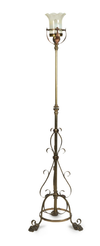 An antique brass standard lamp with yellow vaseline glass shade, converted to electricity, circa 1890s, 195cm high