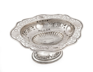 An English sterling silver comport with pierced rim, made in Sheffield, circa 1901, 12cm high, 24cm wide, 19.5cm deep, 412 grams