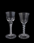 Two Georgian wine glasses with double air twist stems, 18th century, 14cm and 14.5cm high