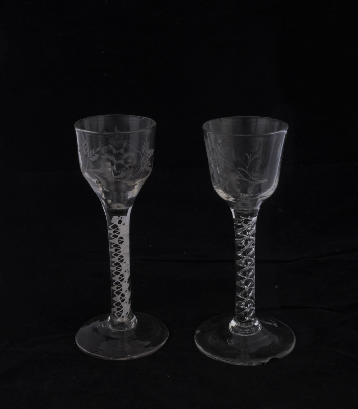 Two Georgian wine glasses with air twist stems and engraved bowls, 18th century, 14.5cm high