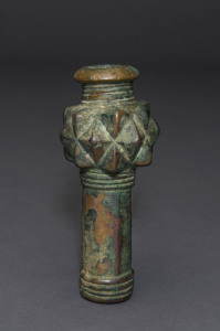 A Persian bronze shafted mace head, circa 3000 B.C. 14cm high