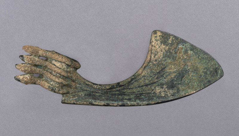 LURISTAN bronze axe head, northern Persian, 1000 B.C. 19cm long. PROVENANCE: Christie's, London, Nov. 1978. Formerly The Harold Peterson Collection