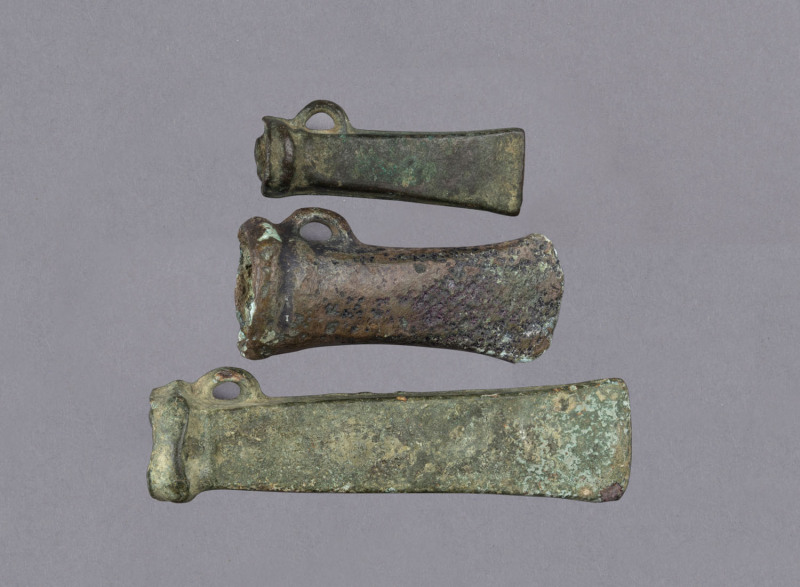Three Celtic bronze age axe heads, 3000 B.C. ​12.5cm, 9cm and 7cm long