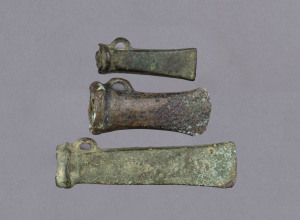 Three Celtic bronze age axe heads, 3000 B.C. 12.5cm, 9cm and 7cm long