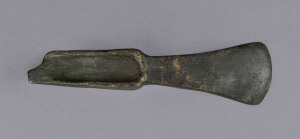 A bronze age axe head, unknown origin, circa 3000 B.C. 14.5cm long