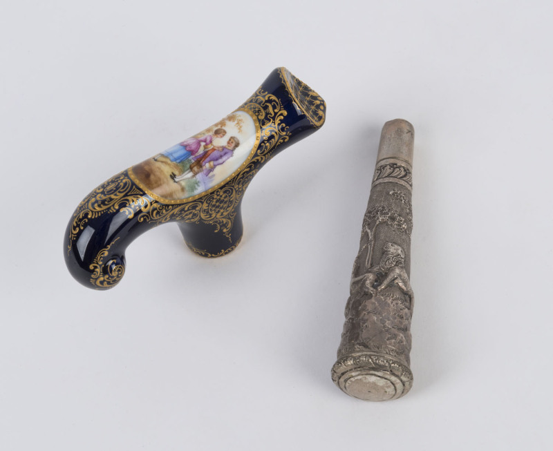 SEVRES French porcelain walking stick handle and a silver walking cane handle, 19th century, the silver handle 11cm high